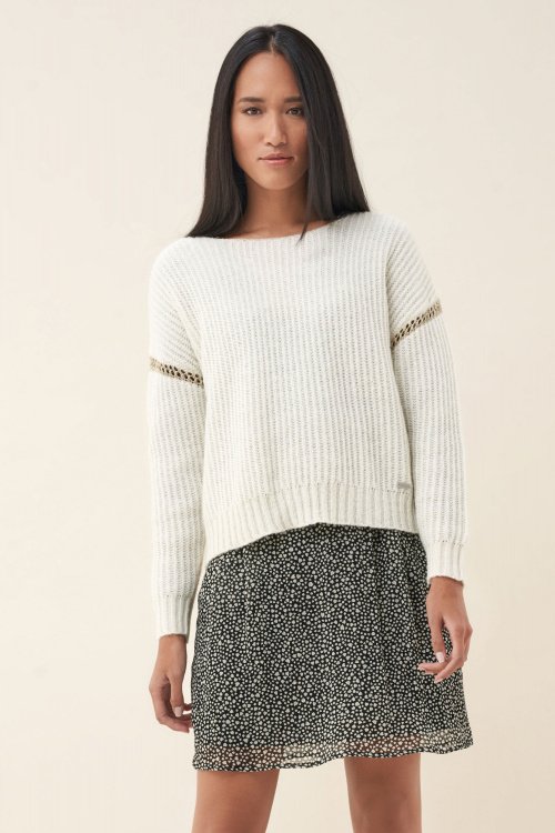 Knitted sweater with band on arm