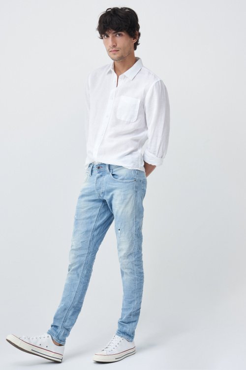 Clash skinny premium wash jeans with wear effect