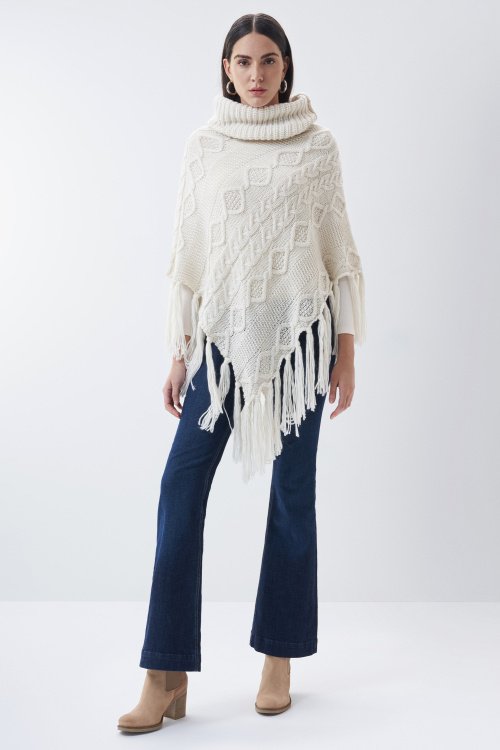 High neck knitted poncho, fringed