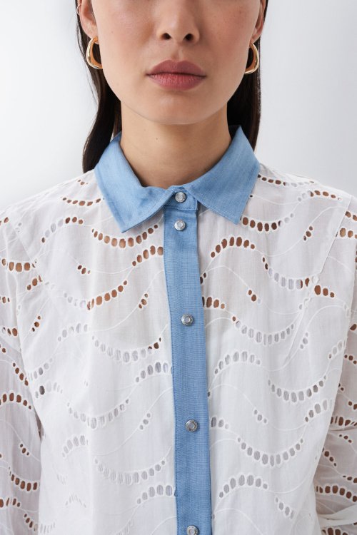 Embroidered shirt with denim inserts