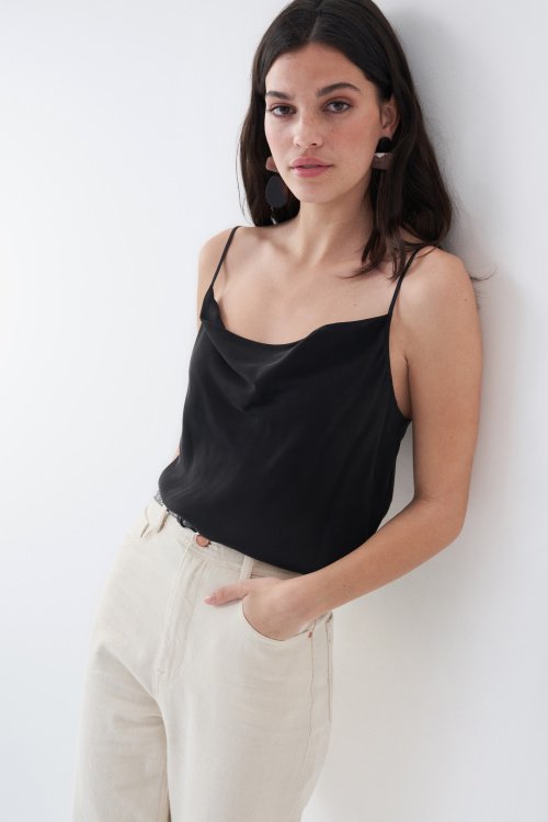 Top with draped neckline