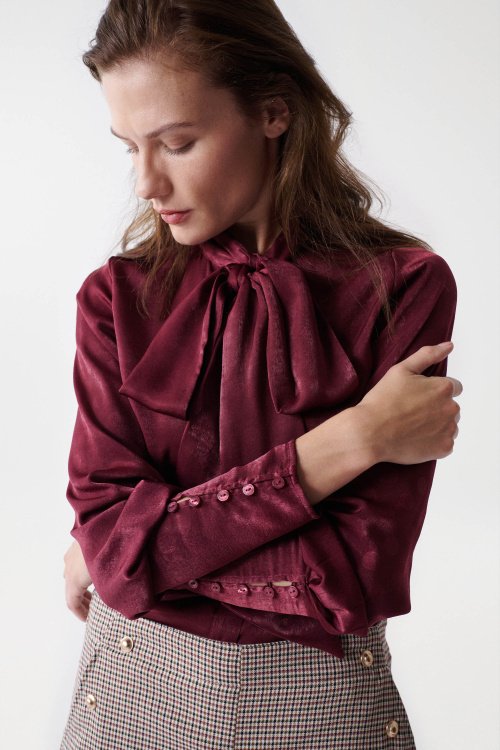 Blouse with embossed effect
