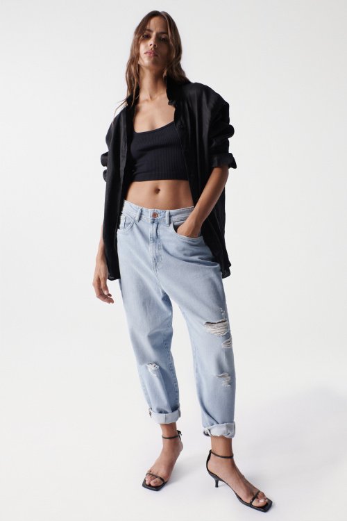 Cropped slim baggy jeans, light colour, with rips