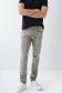 Coloured slim jeans with worn effect
