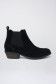 Suede ankle boot with stud detail and a low heel